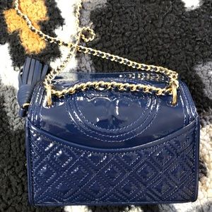 Navy blue small Tory Burch crossbody bag.